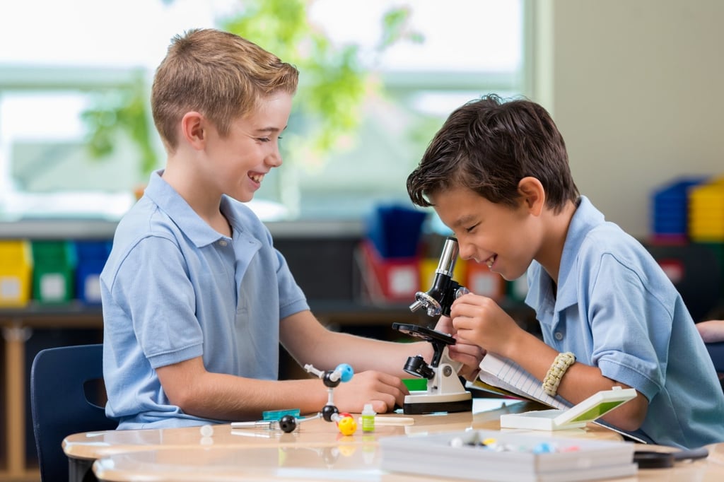 boys with microscope iStock-604338898