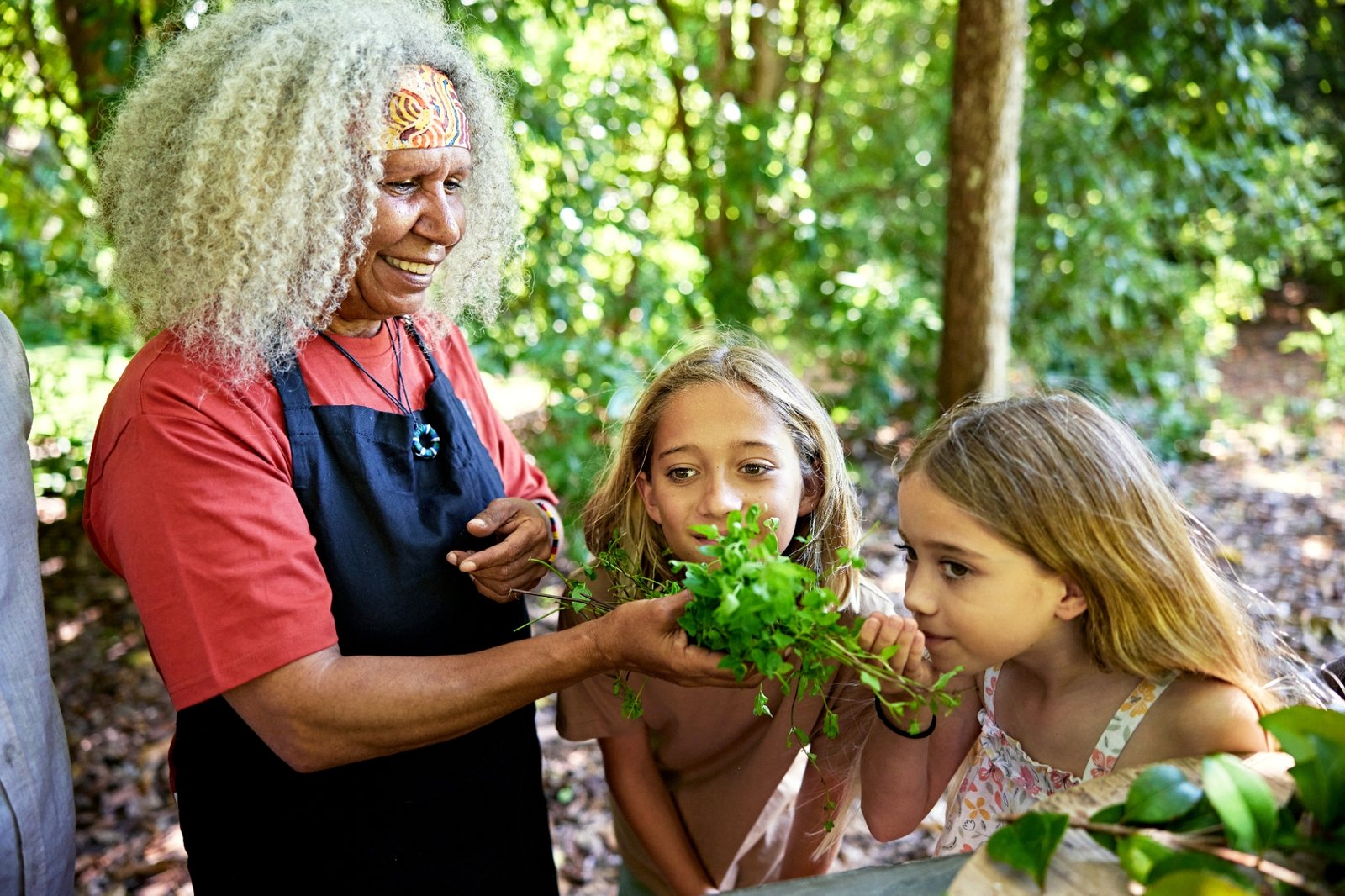first nations woman and children iStock-2195245699