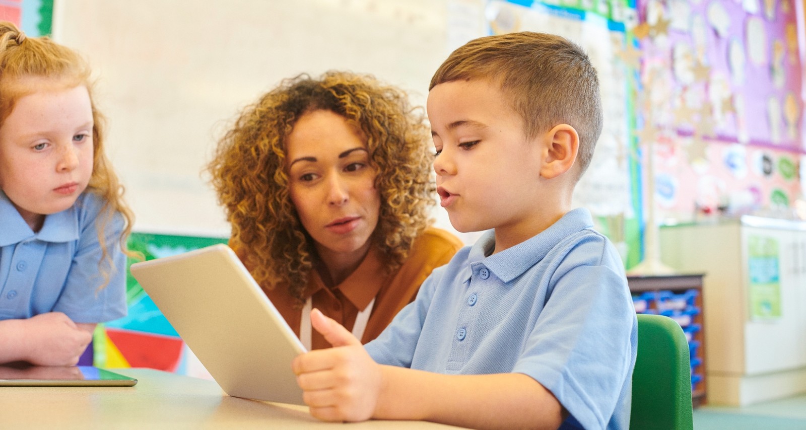 students with ipad istock