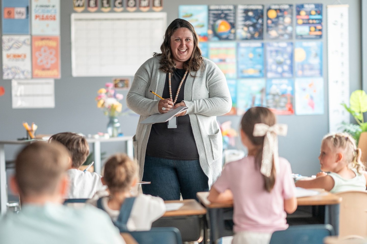 teacher with preschoolers iStock-2228804342