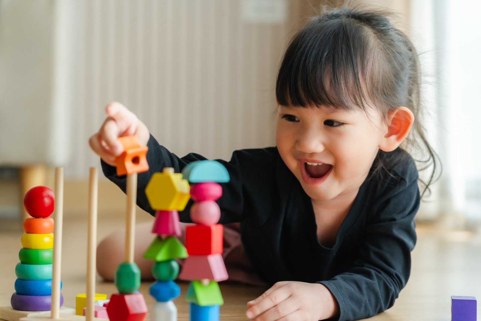 young girl with shapes iStock-2217901800